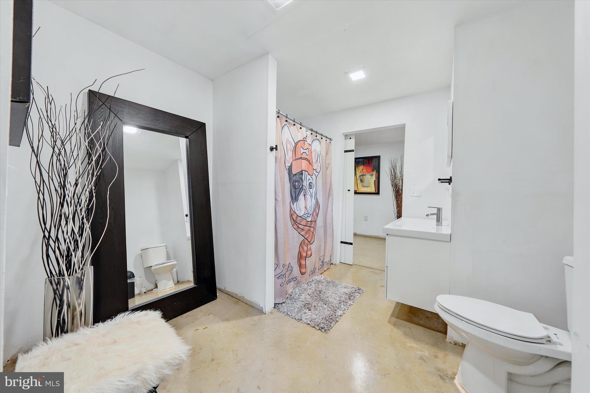 238 Buttonwood Road Landenberg, PA 19350 - Photo 21 of 50 a bathroom with a toilet sink and shower