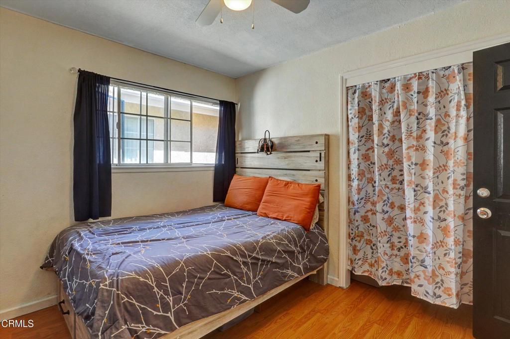 1960 Peoria Place Oxnard, CA 93033 - Photo 16 of 36 a bedroom with a bed and a window