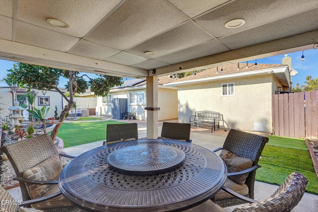 1960 Peoria Place Oxnard, CA 93033 - Photo 32 of 36 a view of a porch with furniture and a yard