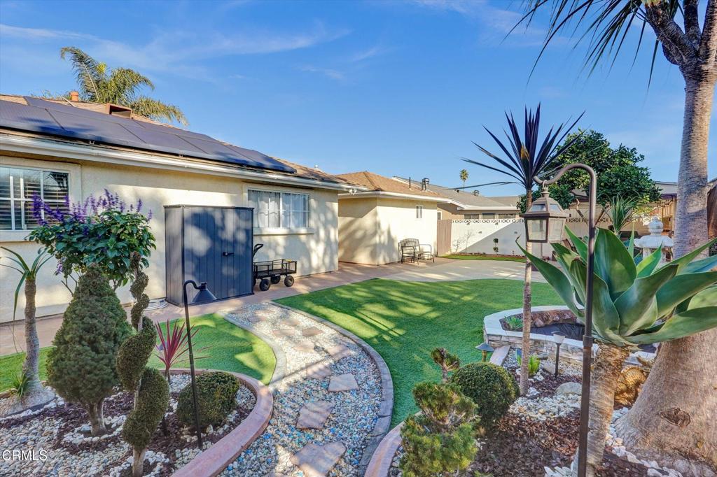 1960 Peoria Place Oxnard, CA 93033 - Photo 33 of 36 a view of a house with a small yard and plants