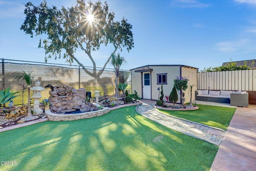 1960 Peoria Place Oxnard, CA 93033 - Photo 35 of 36 a view of a backyard with plants and a garden
