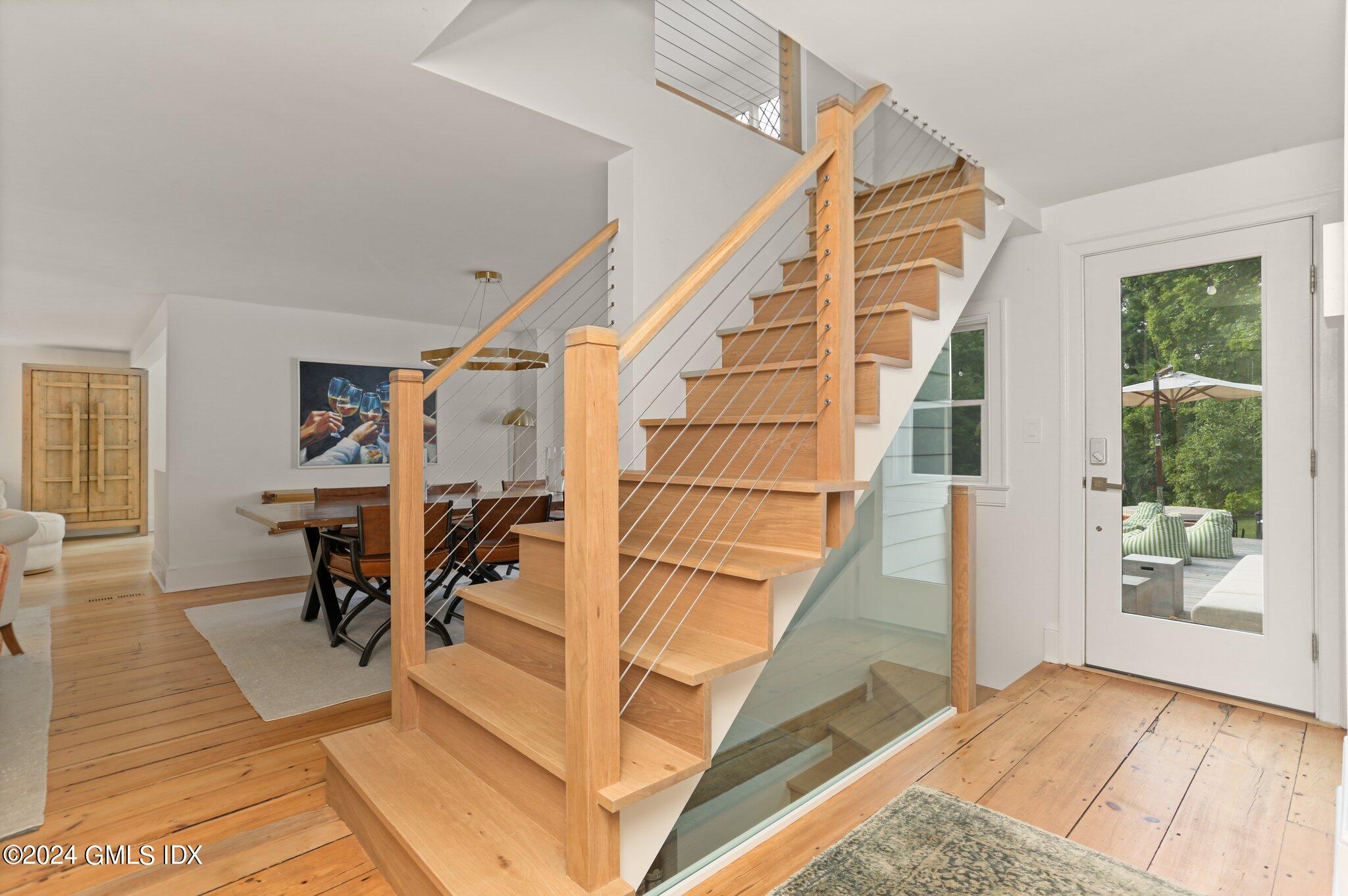 127 Dingletown Road Greenwich, CT 06830 - Photo 18 of 54 a view of entryway with wooden floor and livingroom view