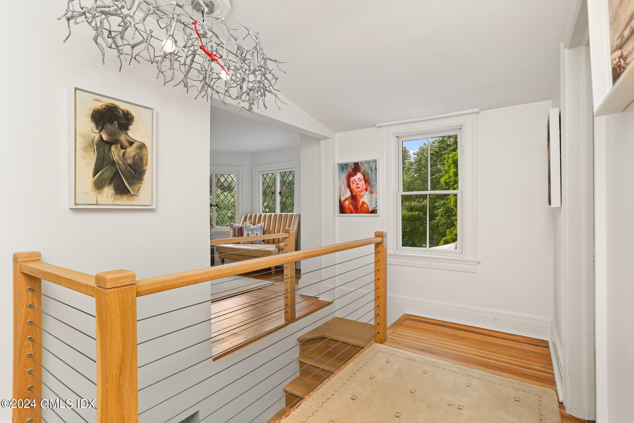 127 Dingletown Road Greenwich, CT 06830 - Photo 19 of 54 a view of a workspace with furniture and a window