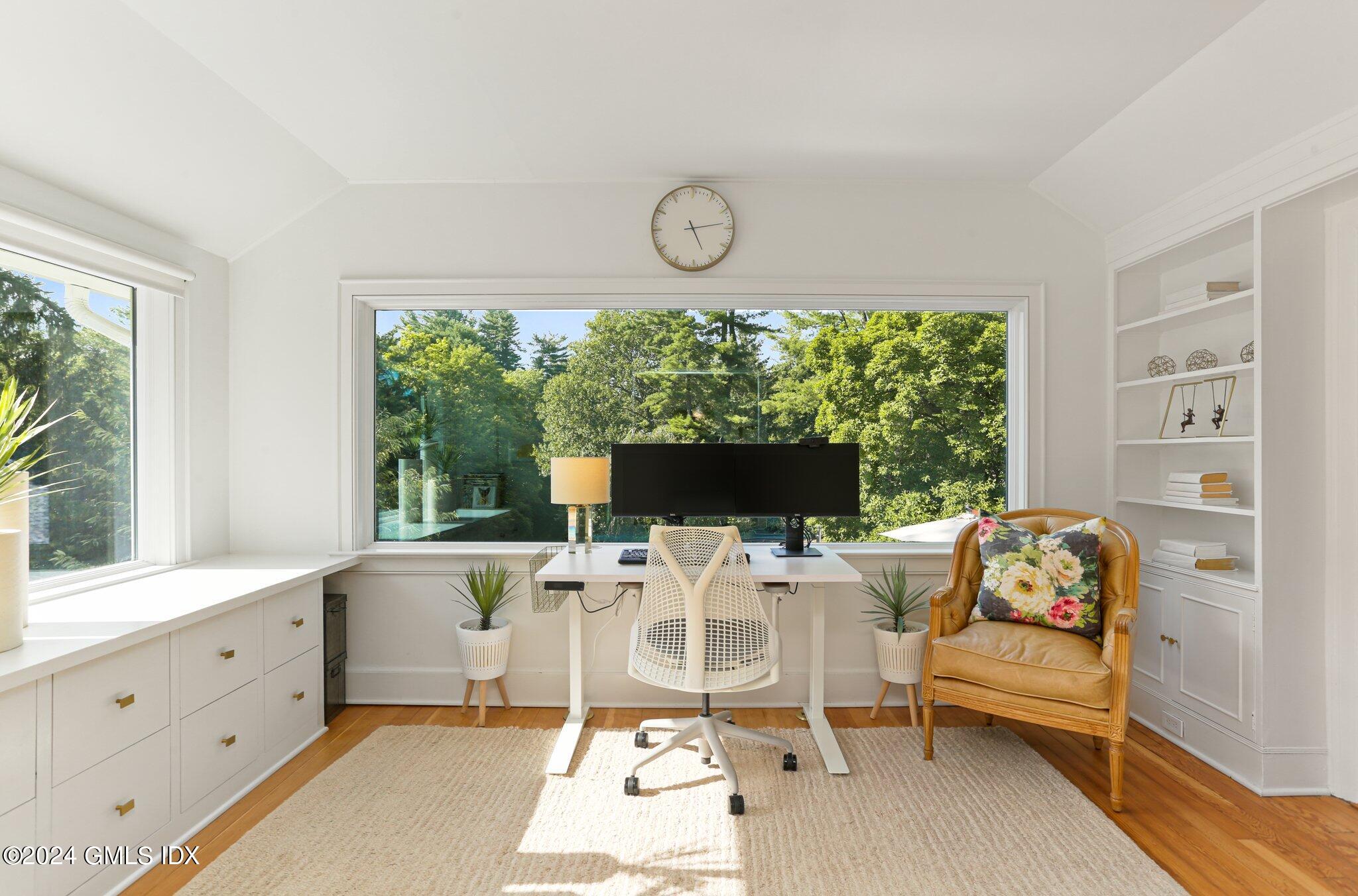 127 Dingletown Road Greenwich, CT 06830 - Photo 23 of 54 a living room with furniture and a large window