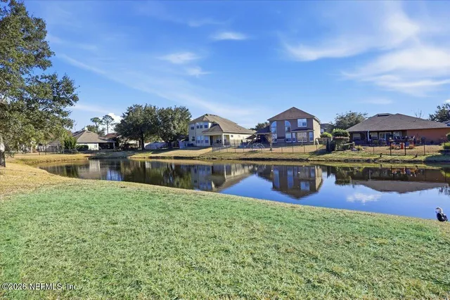 a view of a house with outdoor space and sitting area