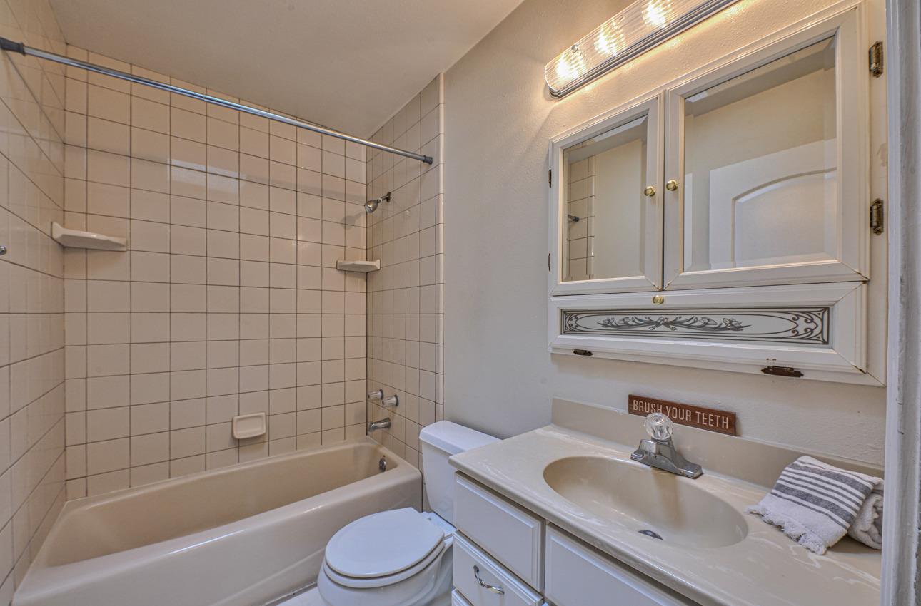 7 Grove Street Salinas, CA 93901 - Photo 27 of 33 a bathroom with a sink toilet tub and shower