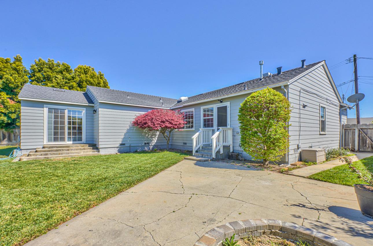 7 Grove Street Salinas, CA 93901 - Photo 28 of 33 a front view of a house with garden