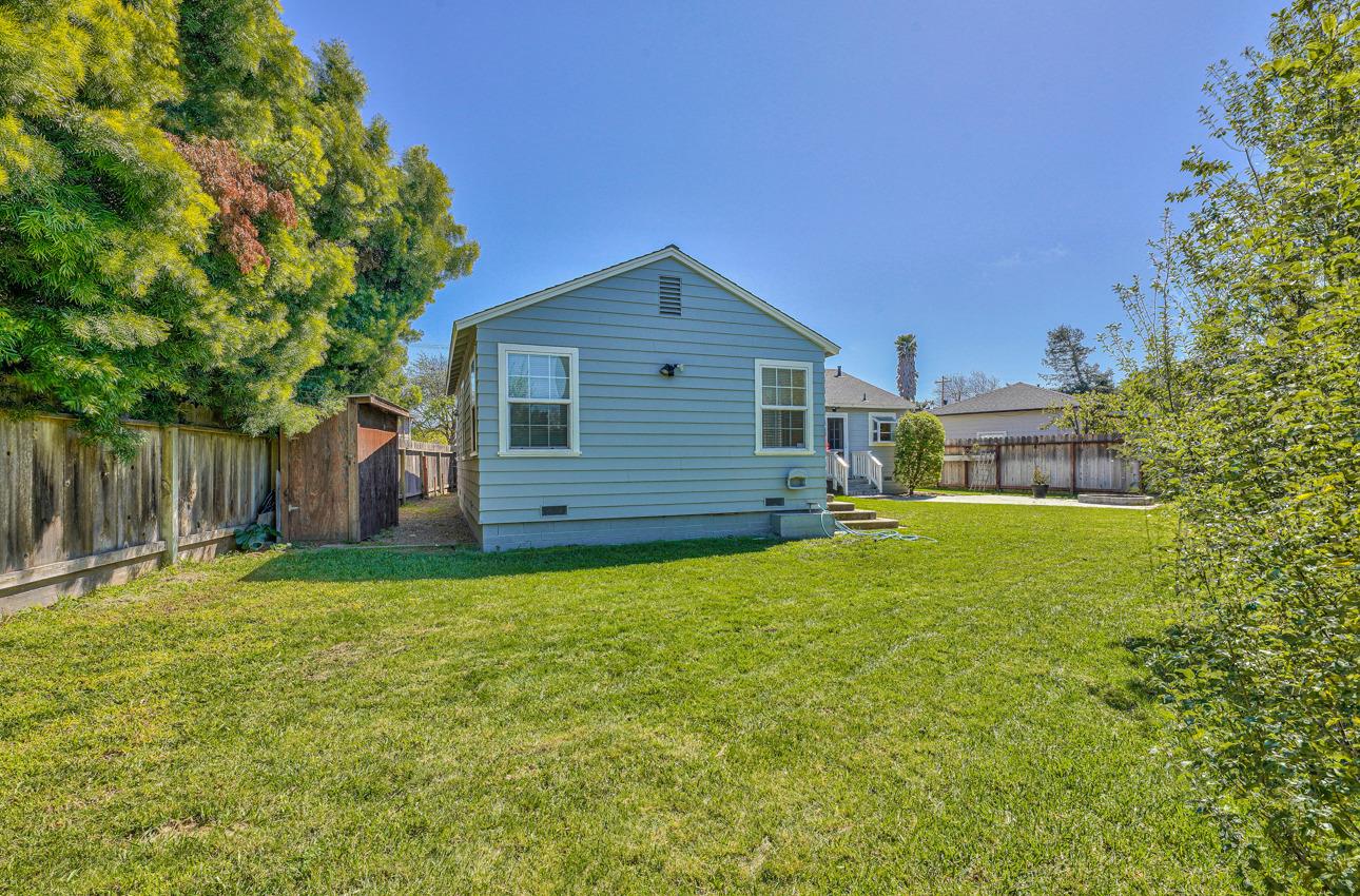 7 Grove Street Salinas, CA 93901 - Photo 30 of 33 a backyard of a house with table and chairs