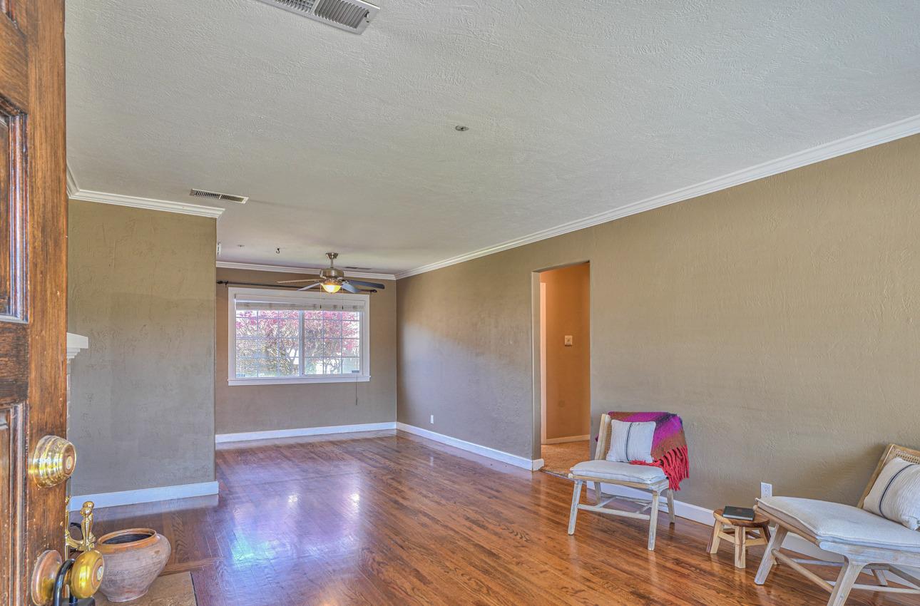 7 Grove Street Salinas, CA 93901 - Photo 4 of 33 a living room with furniture and a wooden floor