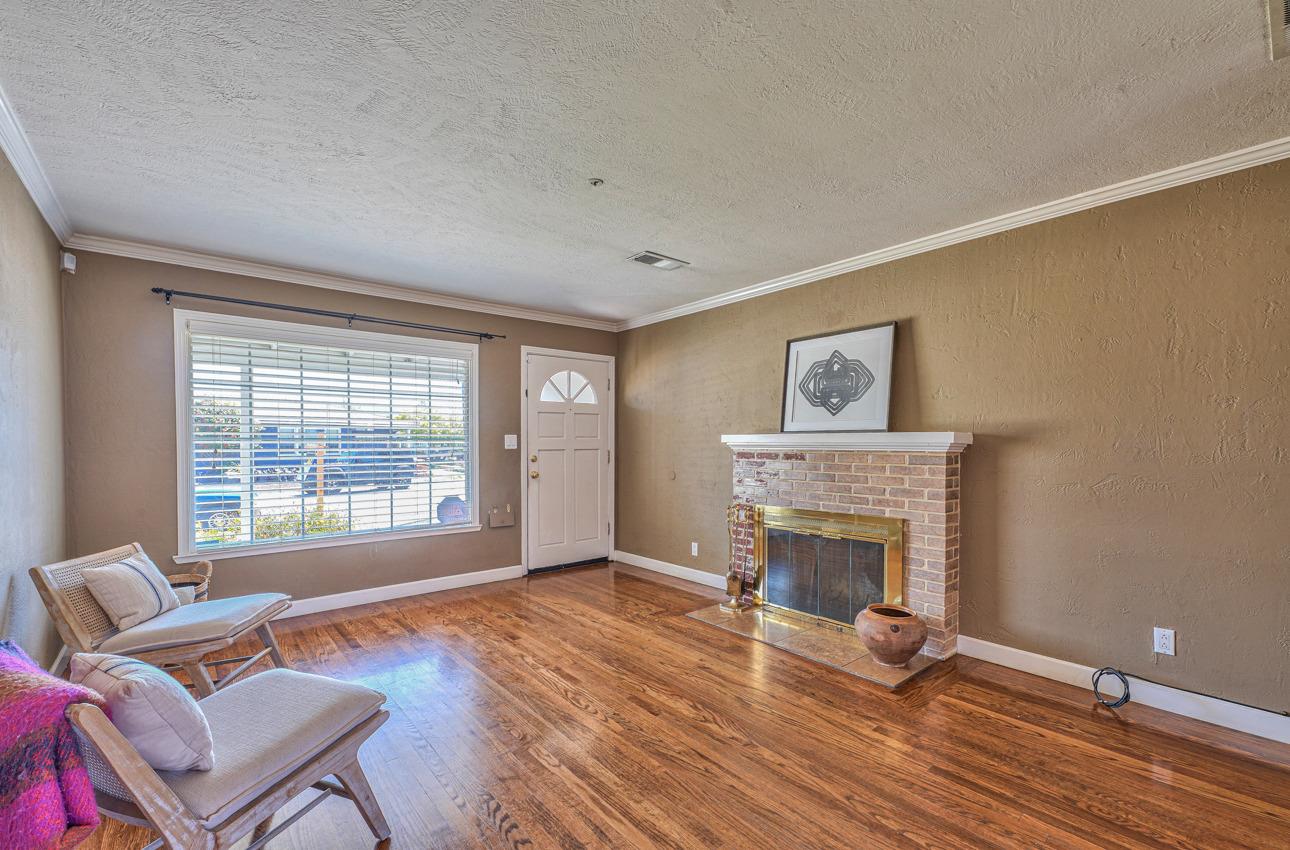 7 Grove Street Salinas, CA 93901 - Photo 5 of 33 a living room with furniture and a fireplace