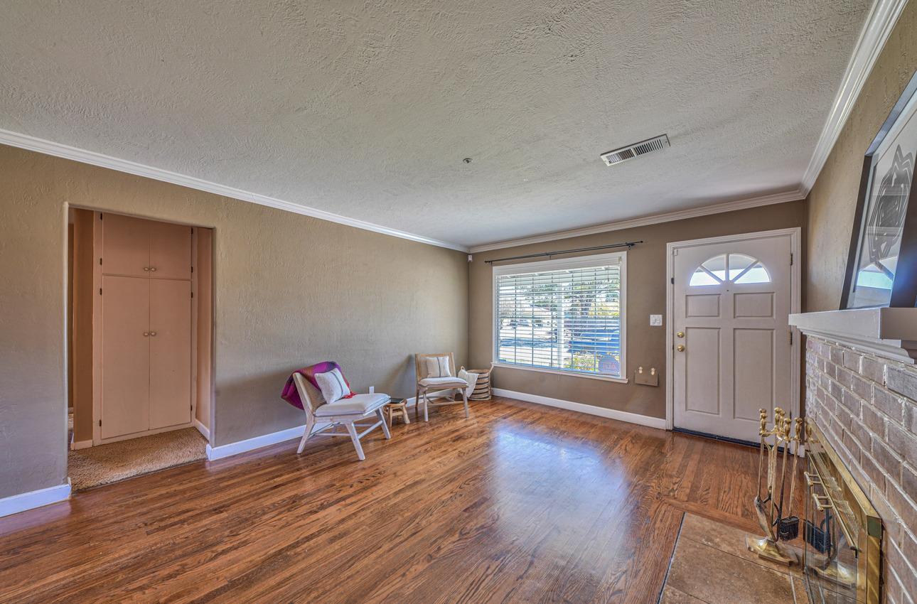 7 Grove Street Salinas, CA 93901 - Photo 6 of 33 a living room with furniture and a wooden floor