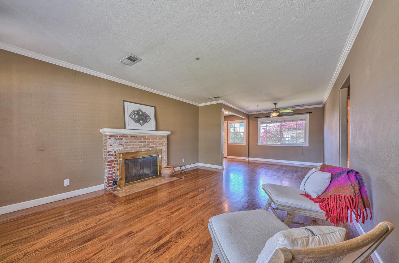 7 Grove Street Salinas, CA 93901 - Photo 7 of 33 a living room with furniture and a fireplace