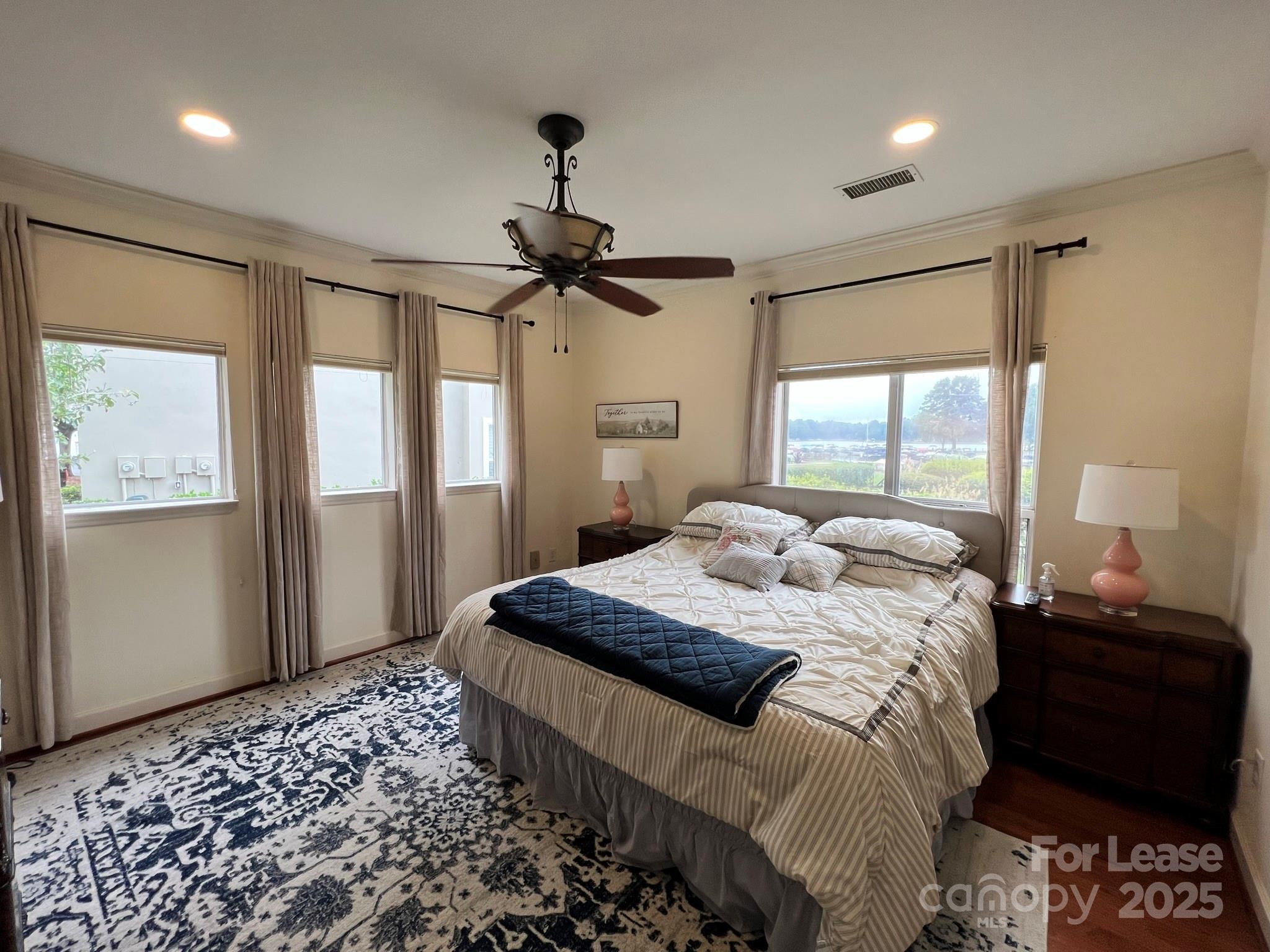 1140 Torrence Circle Davidson, NC 28036 - Photo 25 of 35 a bedroom with a bed and a window