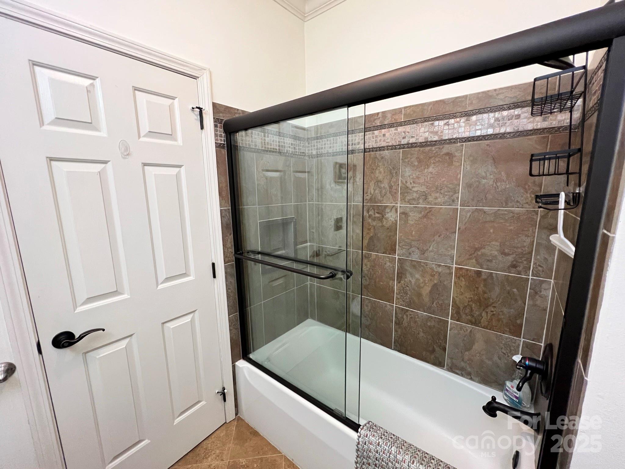 1140 Torrence Circle Davidson, NC 28036 - Photo 9 of 35 a bathroom with a bathtub