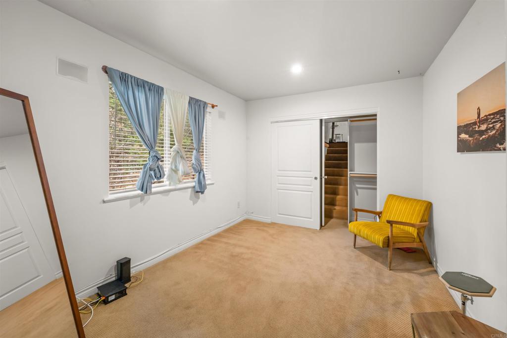 26328 Jacqueline Road Twin Peaks, CA 92391 - Photo 30 of 37 a view of room with stairs and a window