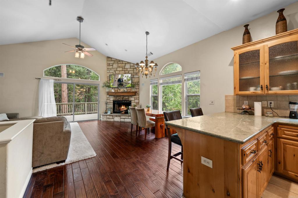 26328 Jacqueline Road Twin Peaks, CA 92391 - Photo 5 of 37 a view of a dining room with furniture window and wooden floor