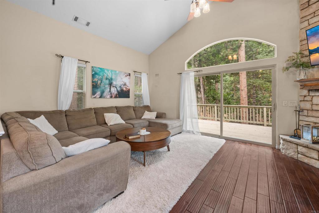 26328 Jacqueline Road Twin Peaks, CA 92391 - Photo 7 of 37 a living room with furniture and a large window