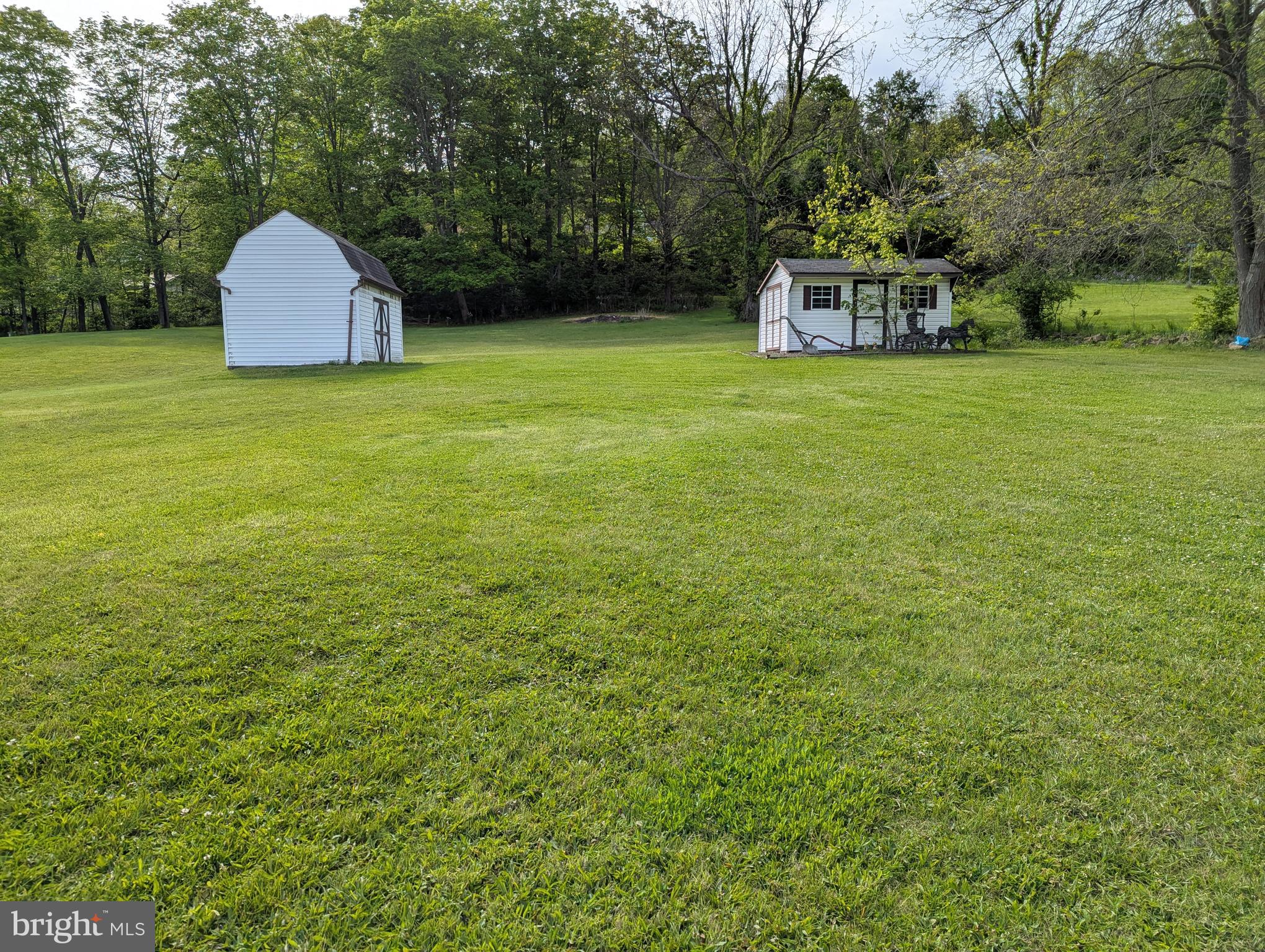 24001 Perry Hill Road Barton, MD 21521 - Photo 13 of 37 a view of a field with a sink and a yard