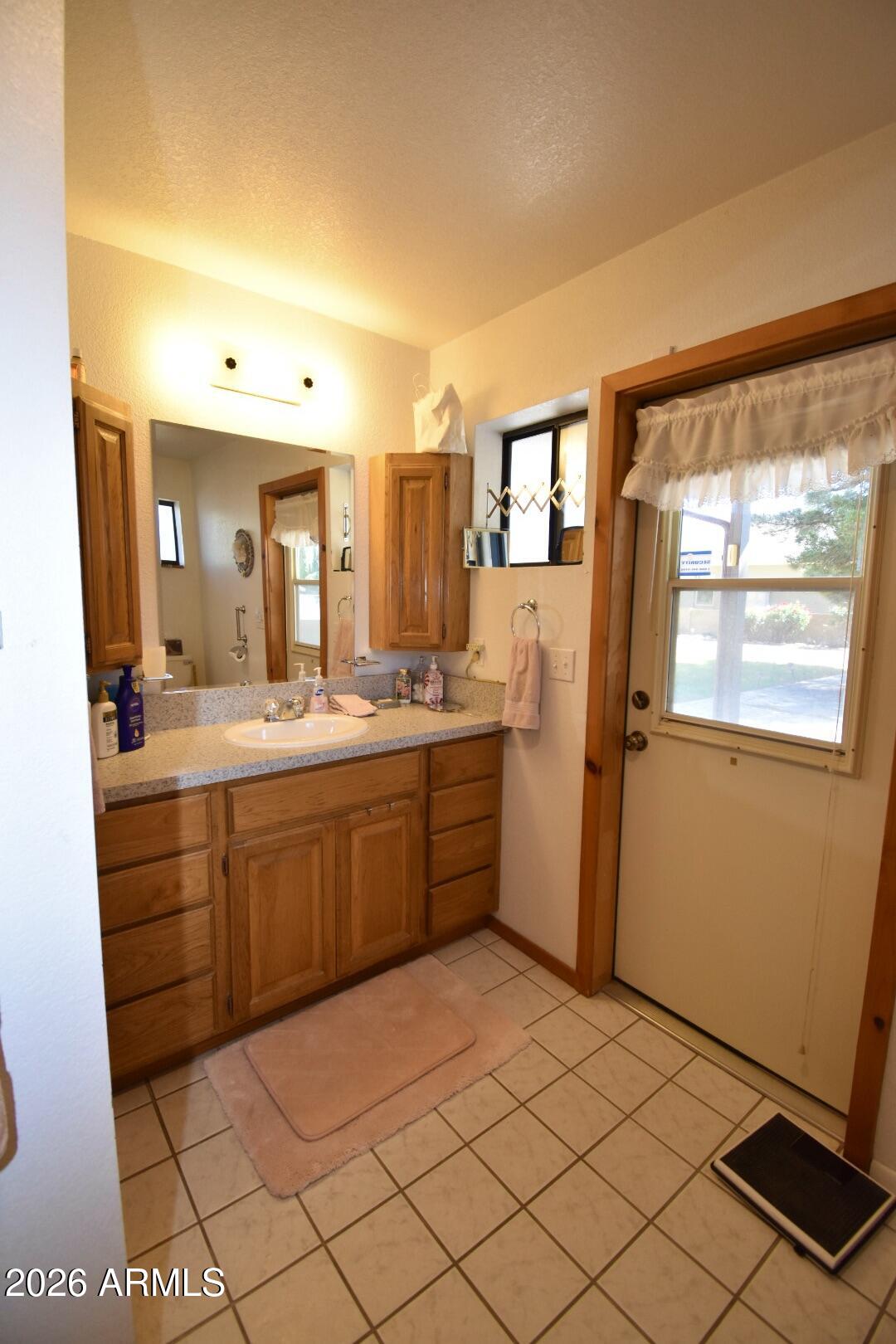 4310 North Lake View Drive Rimrock, AZ 86335 - Photo 19 of 43 a room with a washing machine and sink