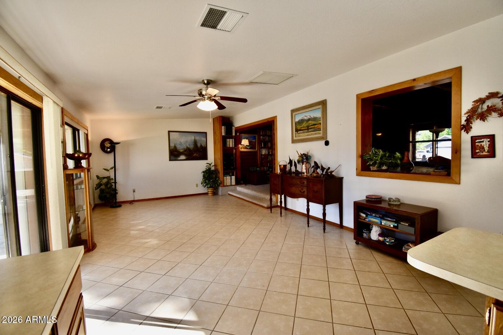 4310 North Lake View Drive Rimrock, AZ 86335 - Photo 21 of 43 a living room with furniture and a flat screen tv