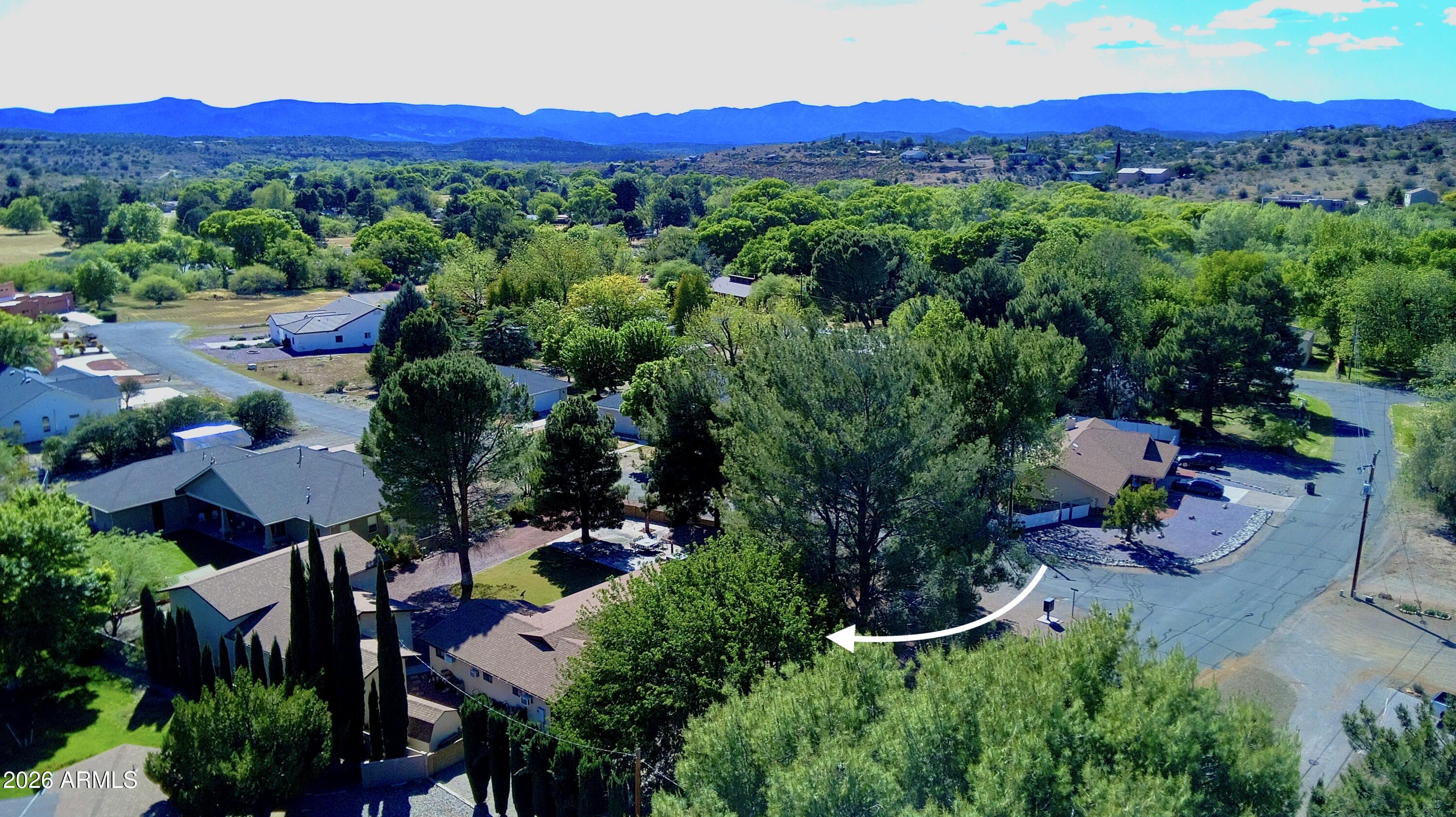 4310 North Lake View Drive Rimrock, AZ 86335 - Photo 38 of 43 an aerial view of a house with yard swimming pool and mountain view