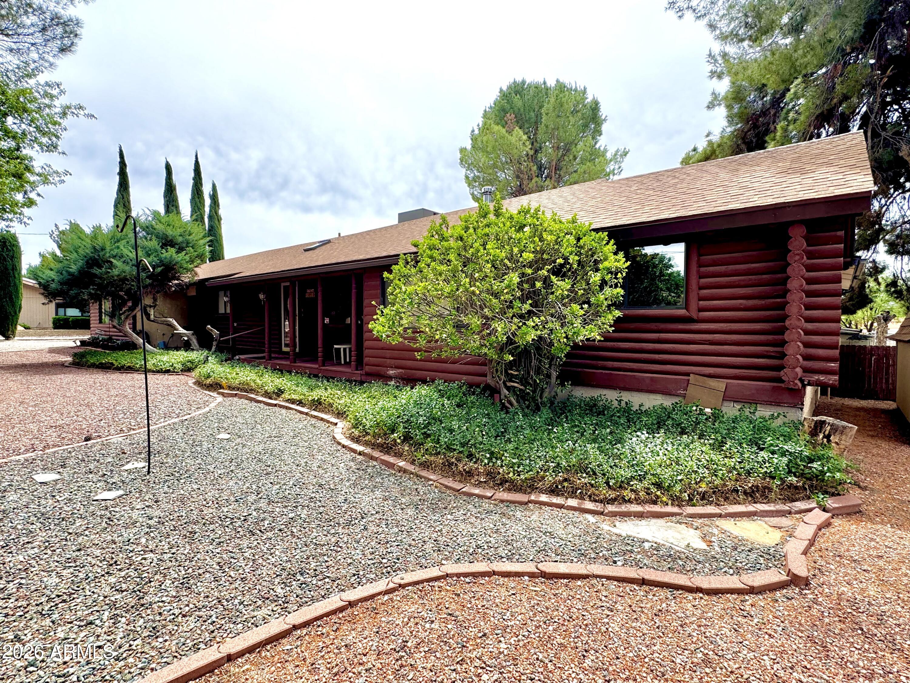 4310 North Lake View Drive Rimrock, AZ 86335 - Photo 41 of 43 a front view of a house with a yard