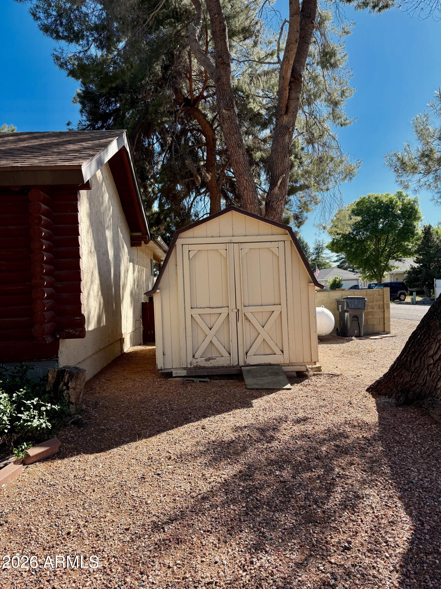 4310 North Lake View Drive Rimrock, AZ 86335 - Photo 42 of 43 a backyard of a house with lots of green space