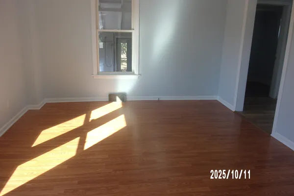 a view of cabinets and window