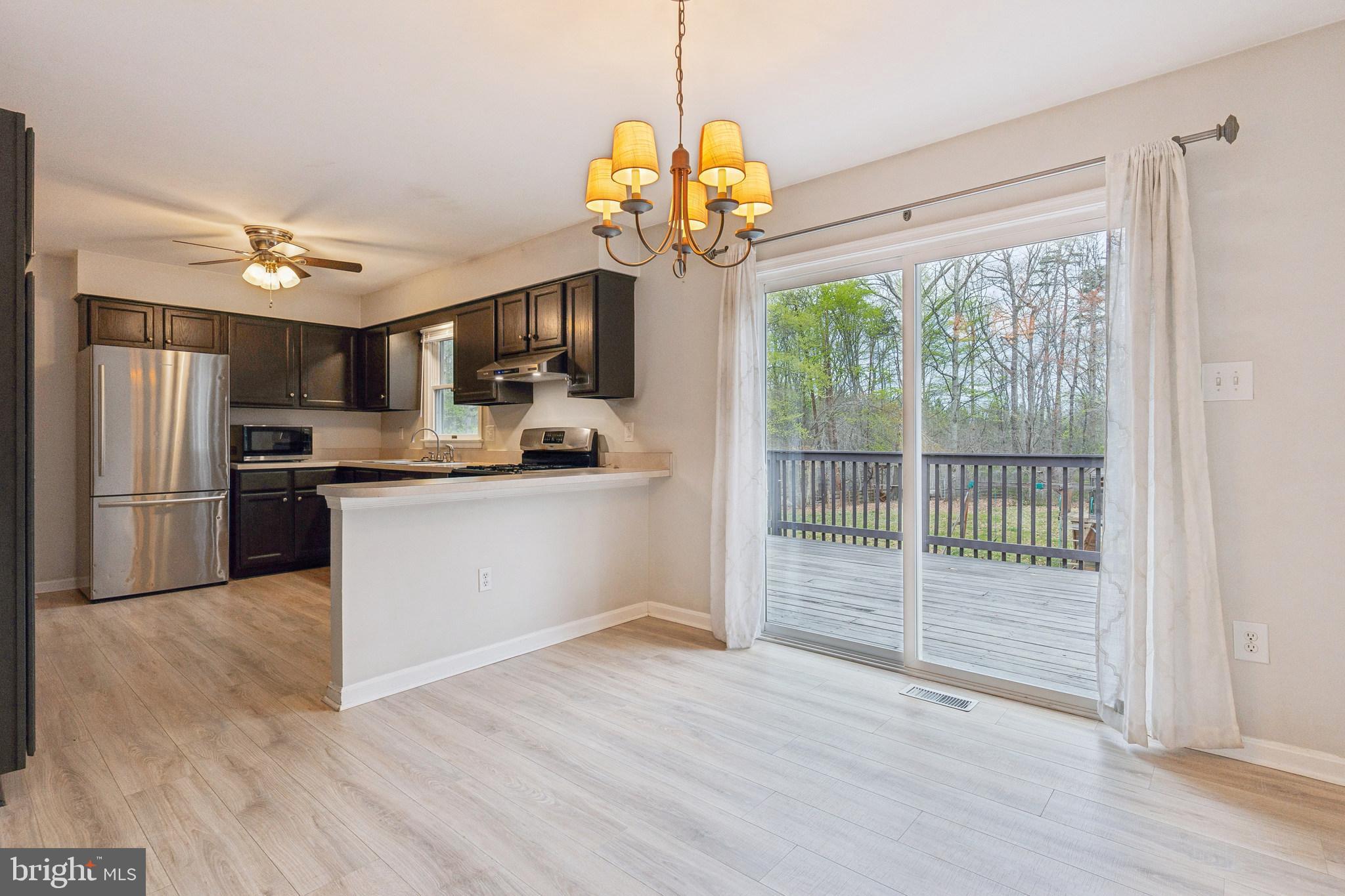 14172 Rogers Ford Road Sumerduck, VA 22742 - Photo 8 of 31 Doors leading to big deck!