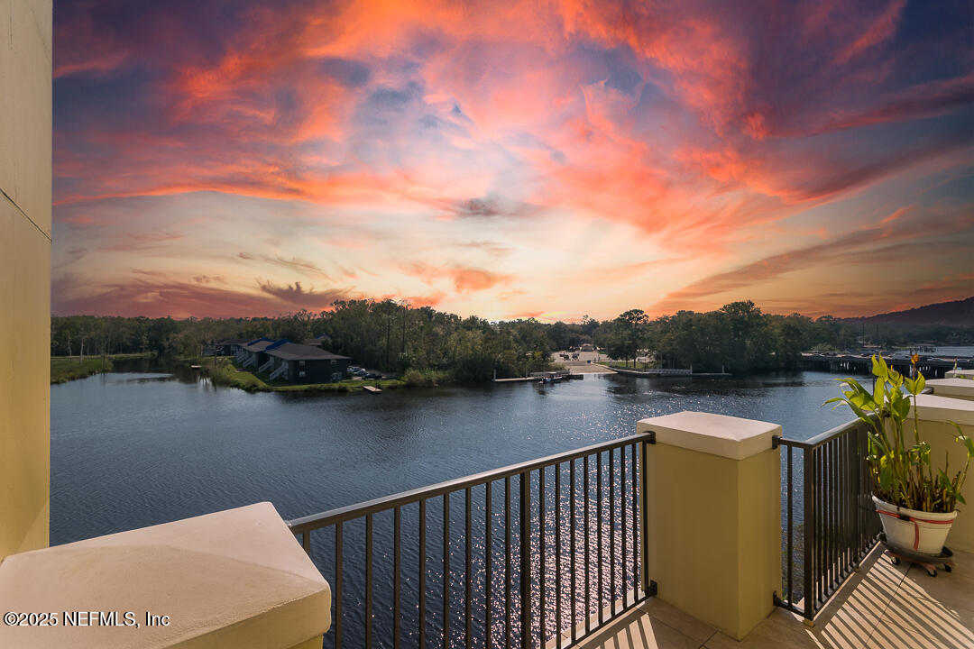 a view of a lake with a terrace