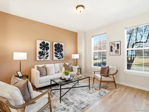 a dining room with furniture window wooden floor