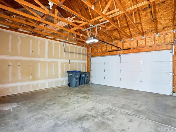 a view of empty room with wooden walls