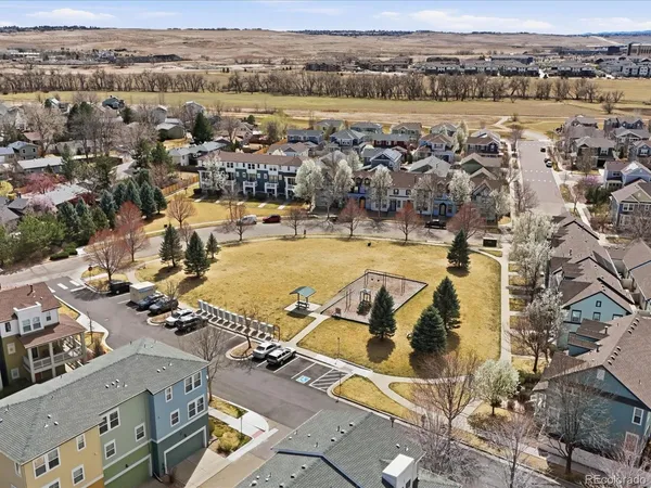 an aerial view of a house with swimming pool