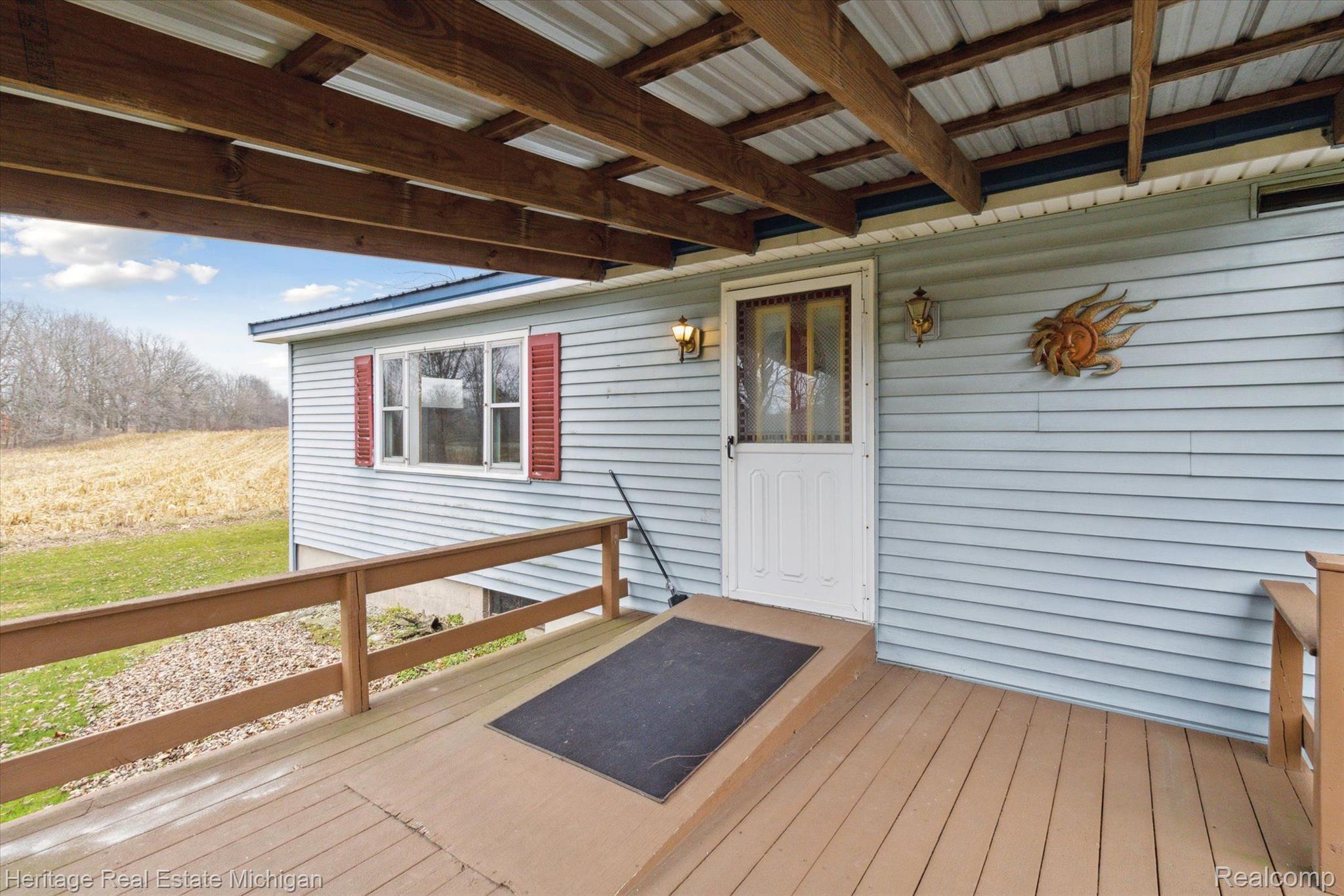998 Lansing Road Morrice, MI 48857 - Photo 8 of 47 Front Porch