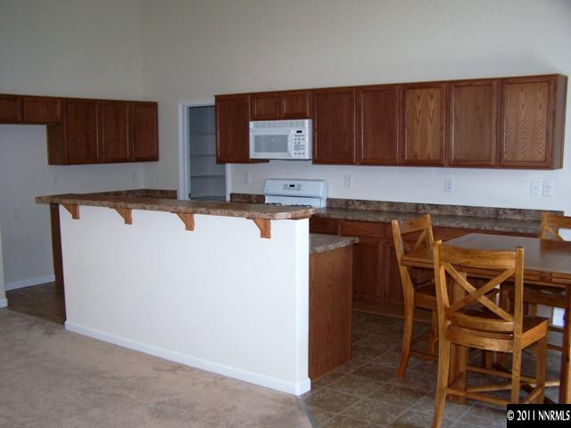 8946 Wynne Street Reno, NV 89506 - Photo 3 of 10 a utility room with dryer and washer