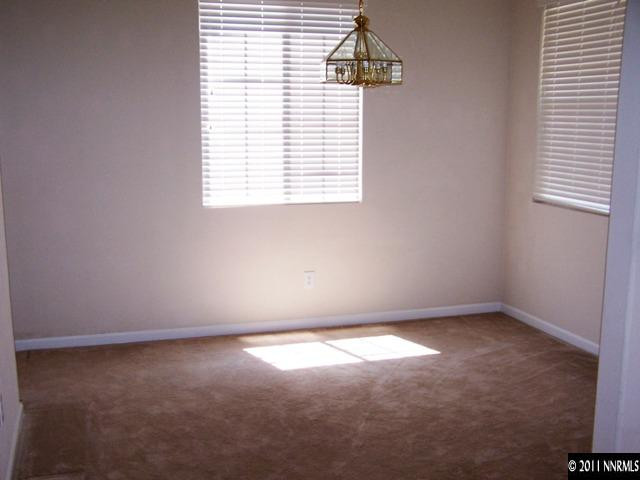 8946 Wynne Street Reno, NV 89506 - Photo 4 of 10 an empty room with a window