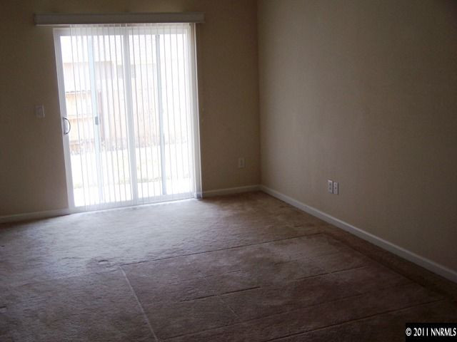 8946 Wynne Street Reno, NV 89506 - Photo 6 of 10 an empty room with a window