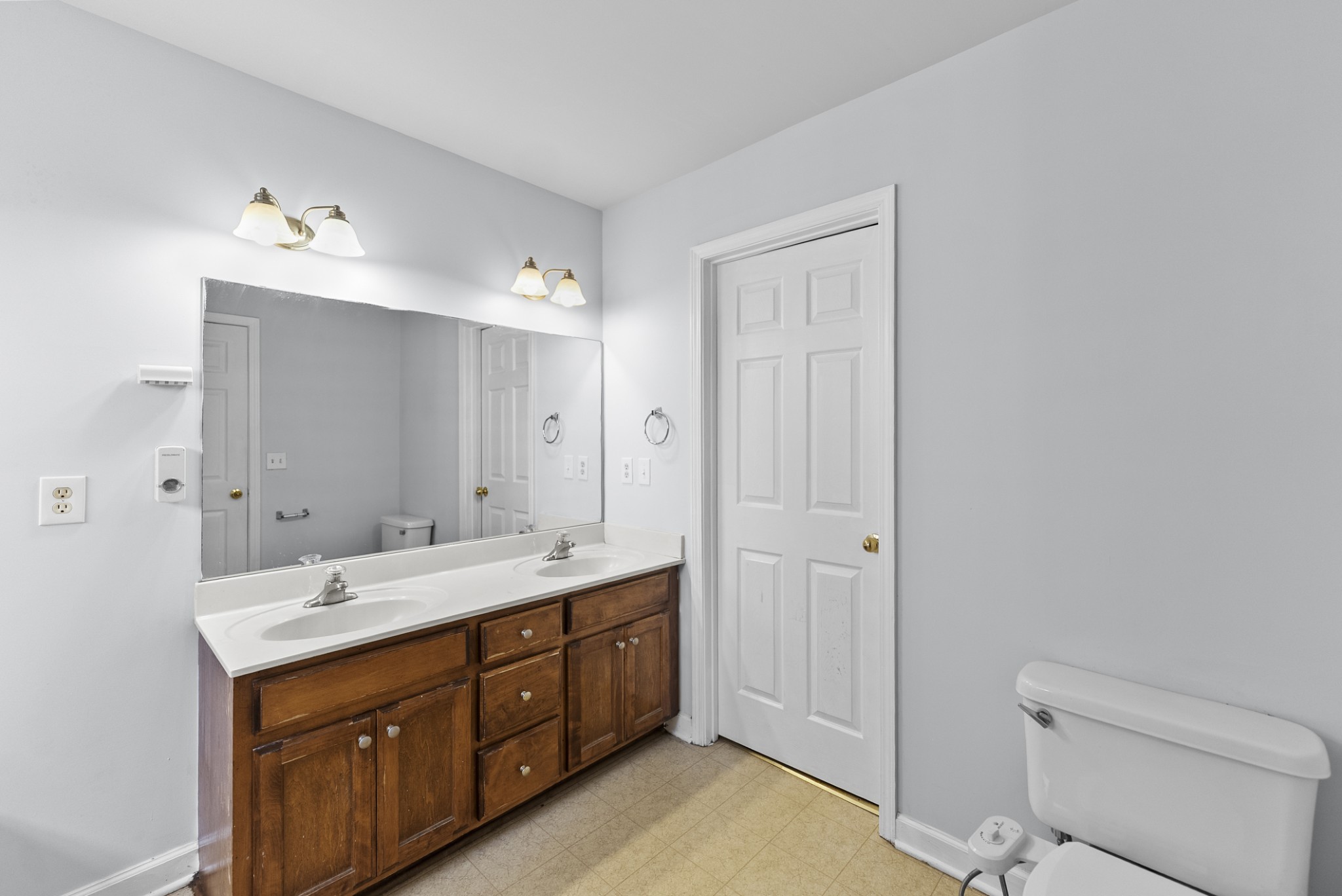 2849 Evergreen Ridge Point Nashville, TN 37217 - Photo 11 of 31 a spacious bathroom with a double vanity sink a toilet and a mirror