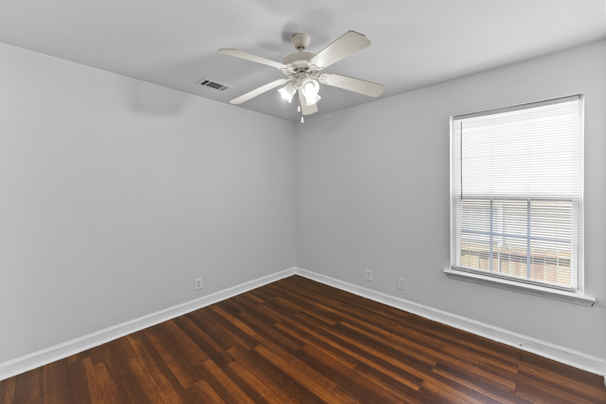2849 Evergreen Ridge Point Nashville, TN 37217 - Photo 14 of 31 an empty room with wooden floor fan and windows