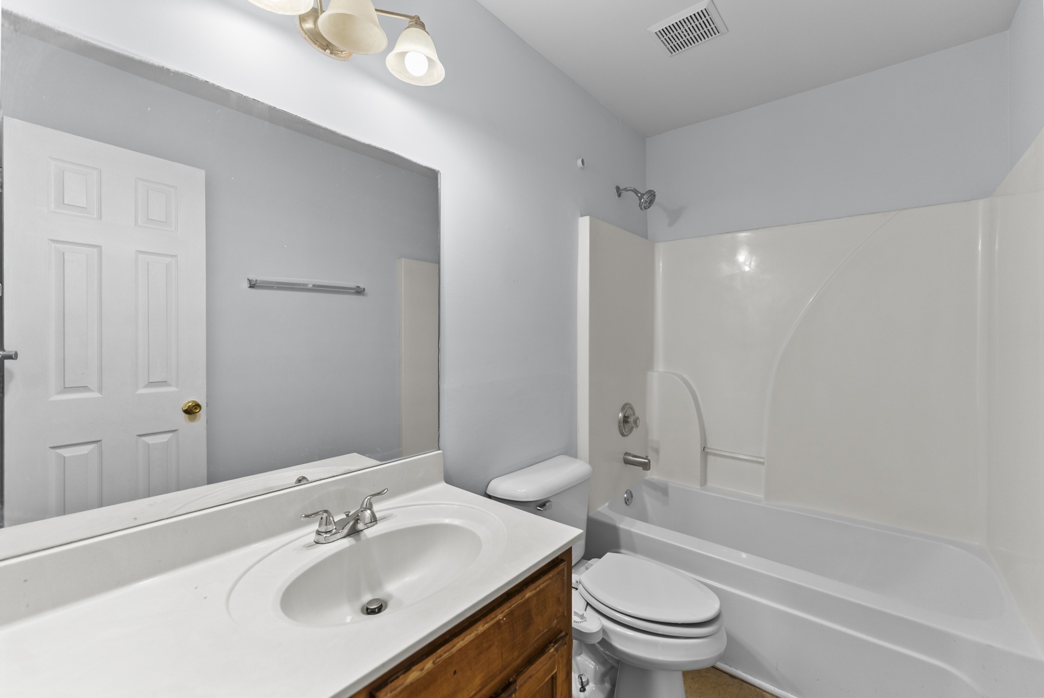 2849 Evergreen Ridge Point Nashville, TN 37217 - Photo 16 of 31 a bathroom with a sink a toilet and a large mirror