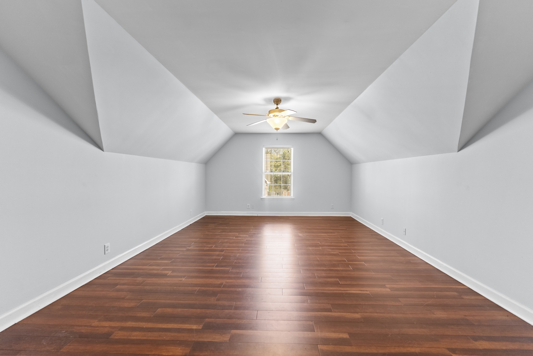 2849 Evergreen Ridge Point Nashville, TN 37217 - Photo 18 of 31 a view of an empty room with wooden floor and a window