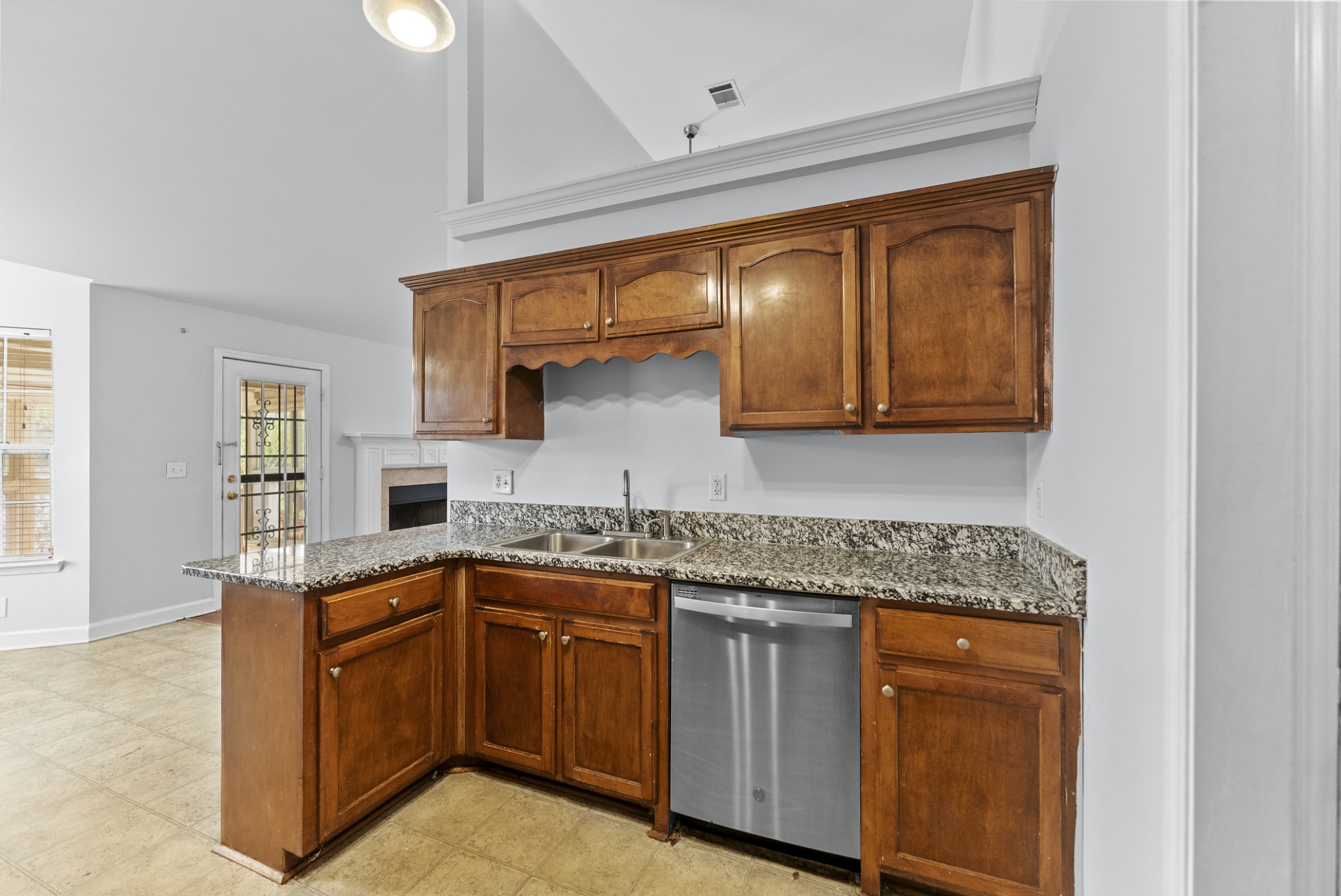 2849 Evergreen Ridge Point Nashville, TN 37217 - Photo 28 of 31 a kitchen with stainless steel appliances granite countertop a sink stove and cabinets