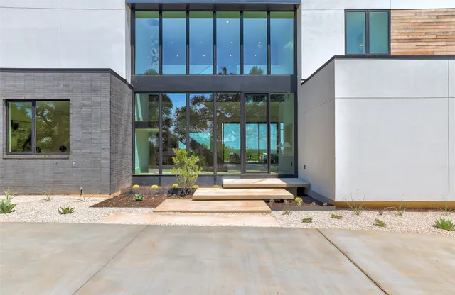 a building exterior with furniture