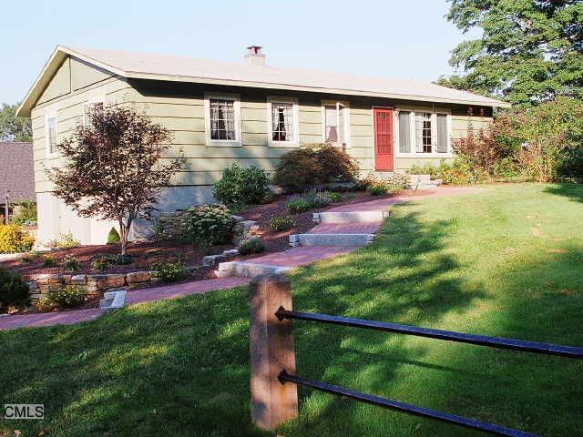 Watertown Road Morris, CT 06763 - Photo 1 of 1 a front view of a house with garden