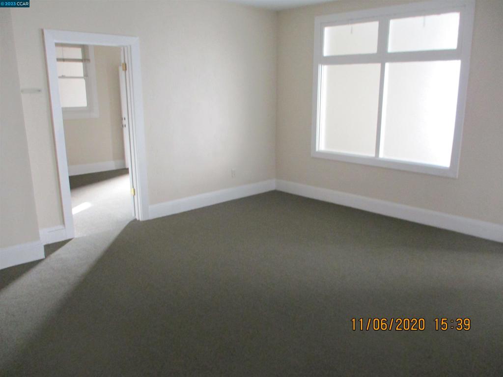 116 South School Street Ukiah, CA 95482 - Photo 5 of 6 an empty room with a window