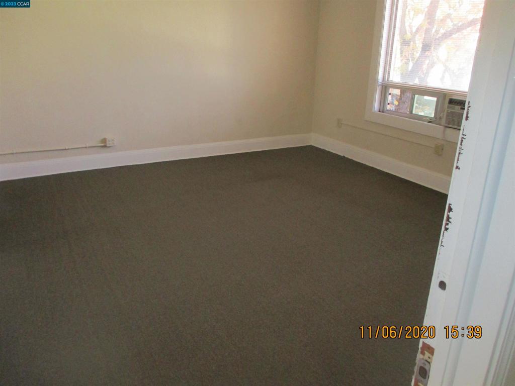 116 South School Street Ukiah, CA 95482 - Photo 6 of 6 an empty room with a window