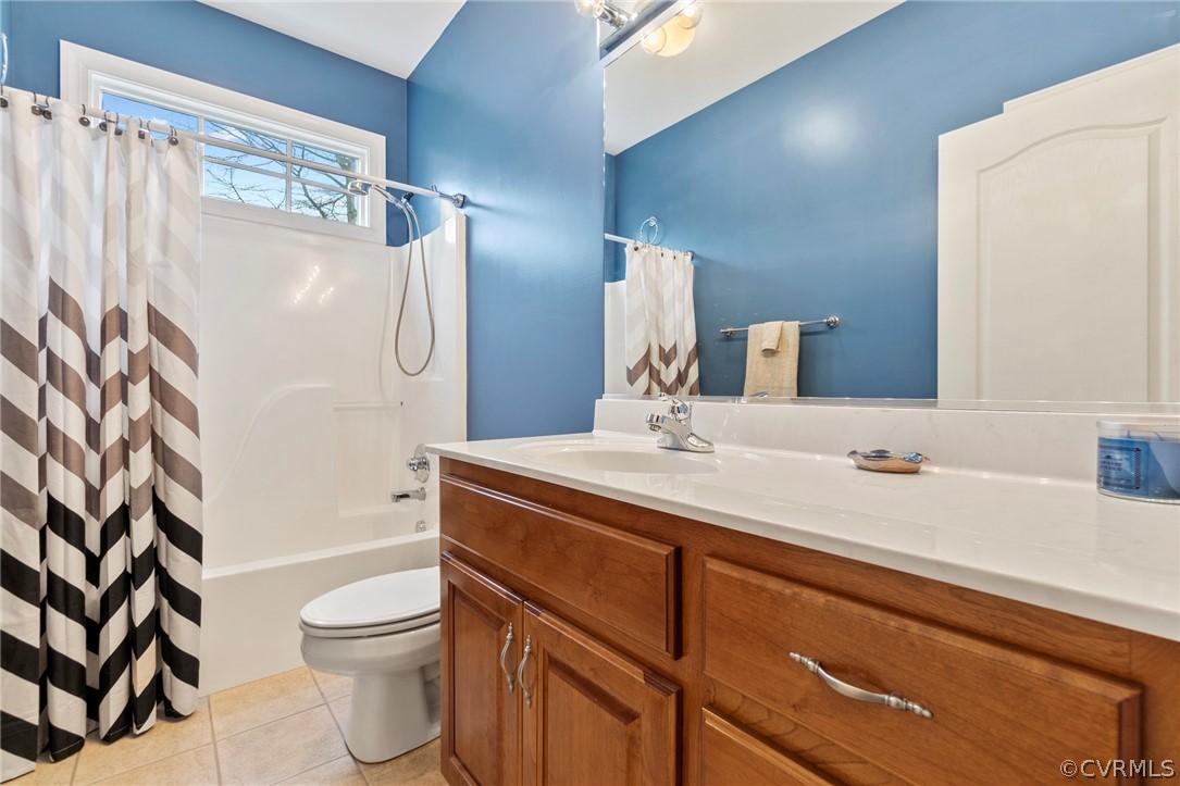 847 Club Ridge Terrace Chester, VA 23836 - Photo 19 of 35 a bathroom with a sink a toilet and shower
