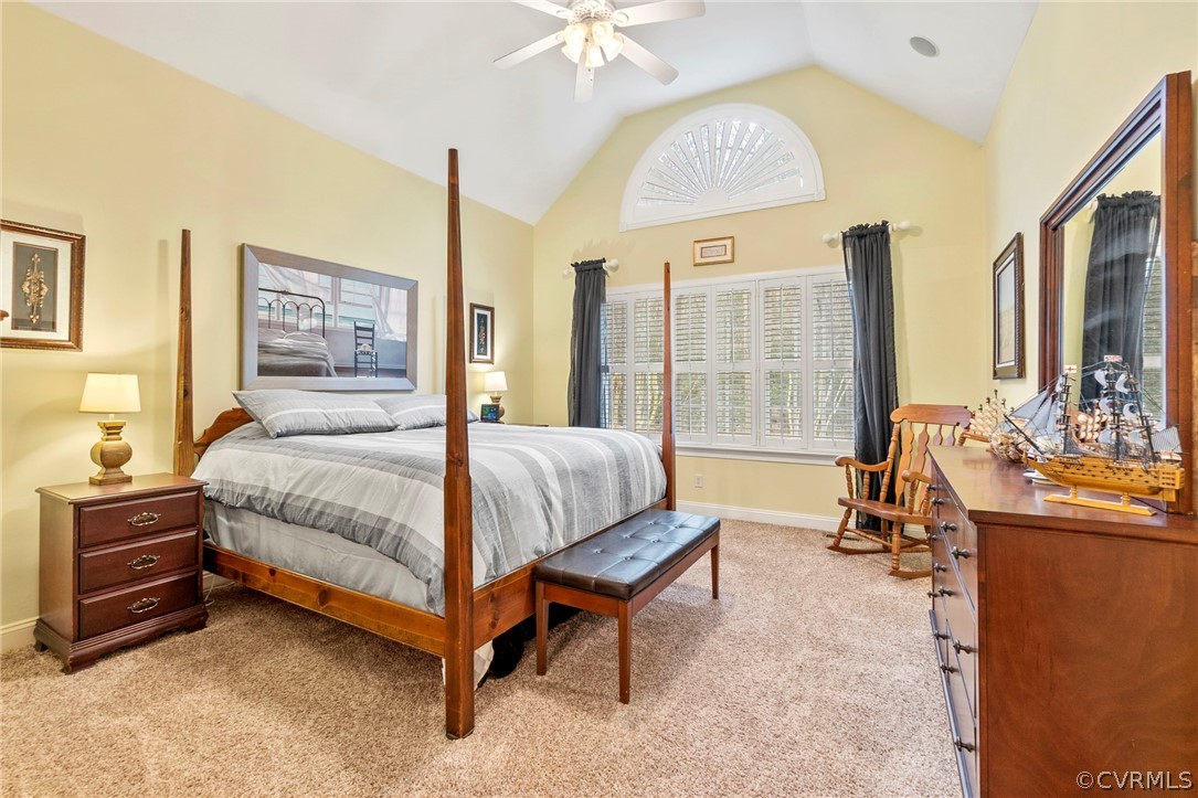 847 Club Ridge Terrace Chester, VA 23836 - Photo 23 of 35 a bedroom with a bed and a chandelier