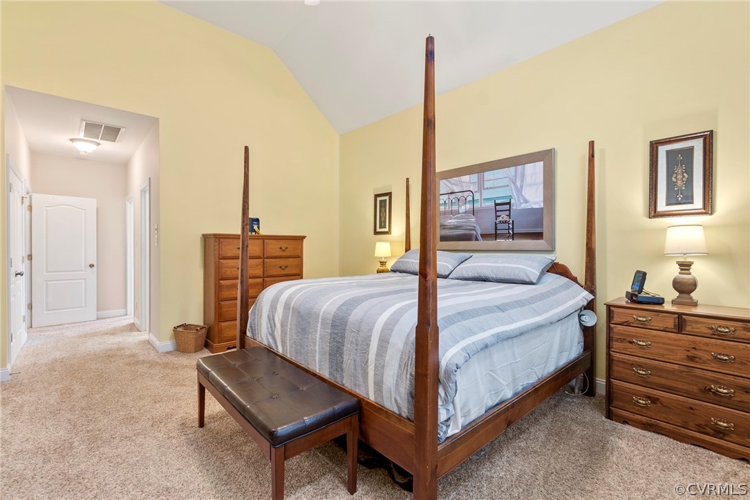 847 Club Ridge Terrace Chester, VA 23836 - Photo 24 of 35 a bedroom with a bed table and chair