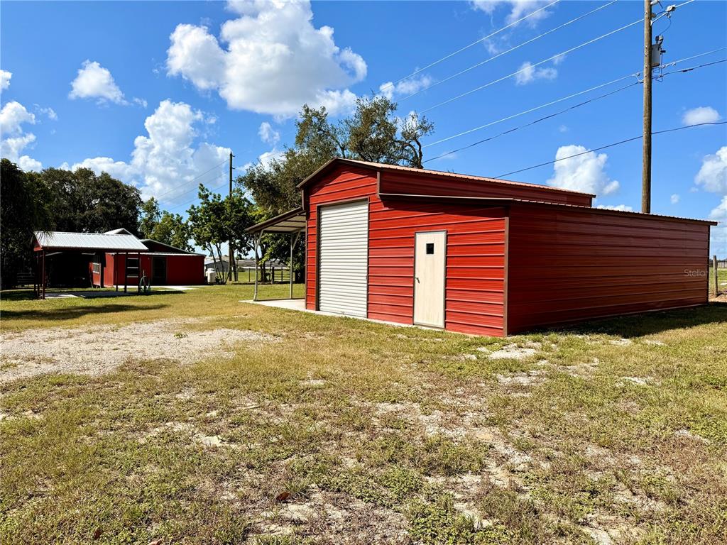 111 Water Tank Road Haines City, FL 33844 - Photo 34 of 48 a front view of a house with a yard